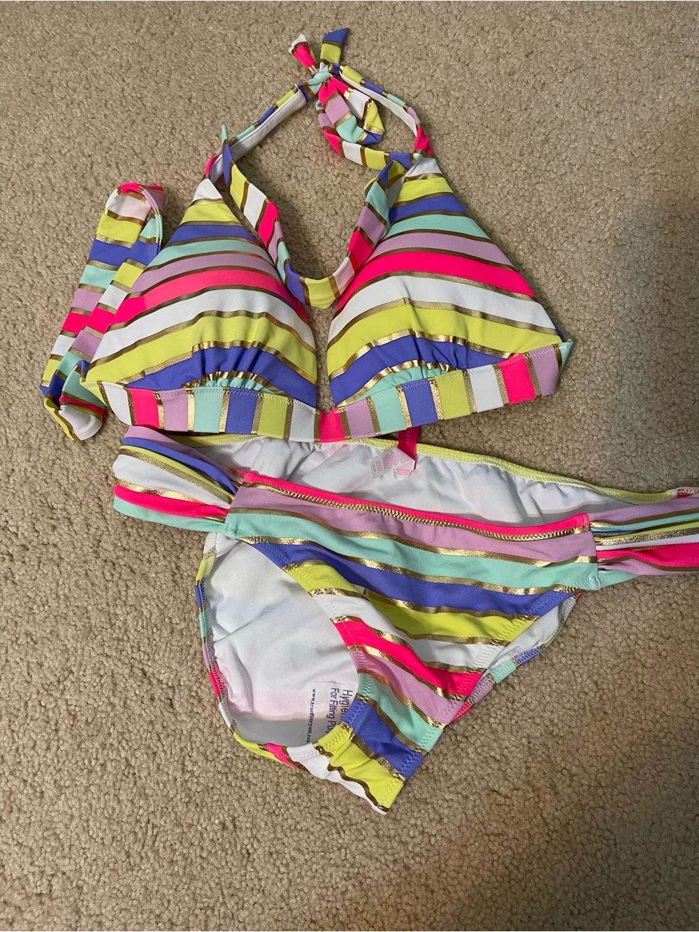 NWOT Victoria’s Secret Triangle top Striped Bikini. Size M.